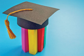 Graduation cap supported by pillars of different colors.
