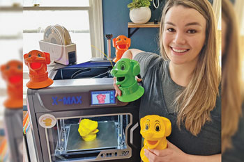Stephanie Feero displays her 3D-printed Chomper Champs.